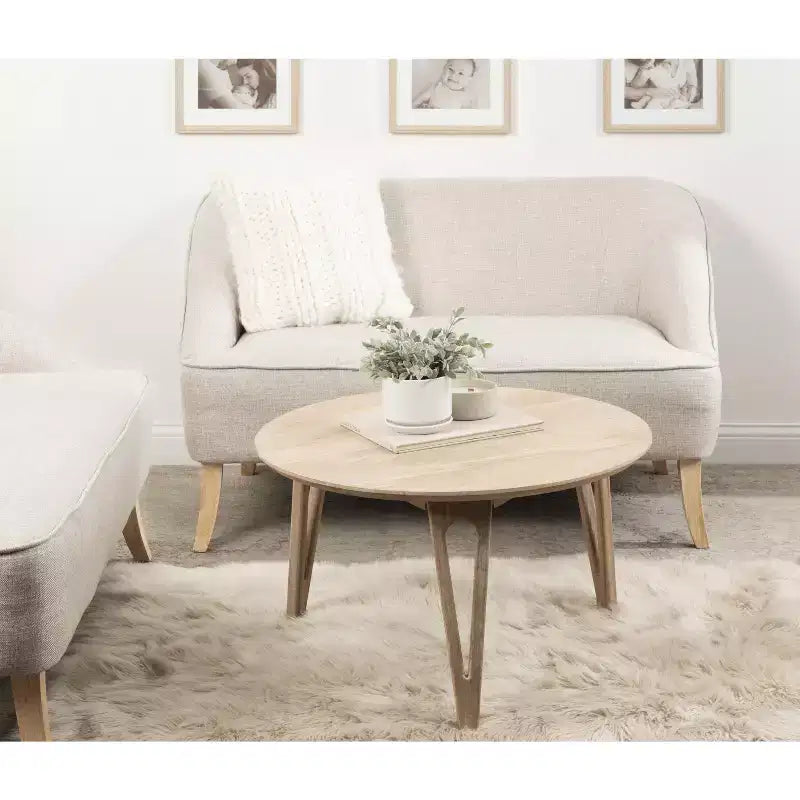 Table basse ronde en manguier avec pieds épingle à cheveux